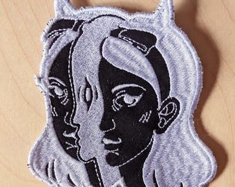 Sew-on machine embroidered patch | White on Black | Devil girl portrait | Surreal art from Montreal