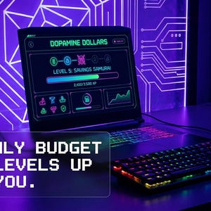 May include: A laptop screen shows a financial interface with the words "Dopamine Dollars" and "Level 5: Savings Samurai." A keyboard and mouse with colourful lights are in front of the laptop. The text "THE ONLY BUDGET THAT LEVELS UP WITH YOU" is at the bottom.