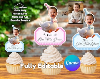 May include: Custom face swap cupcake toppers featuring a baby's face on a goose. The toppers are personalized with names and ages, with the text "Oliver is One Silly Goose" and "Amali is One Silly Goose". The cupcakes have white frosting and are fully editable.