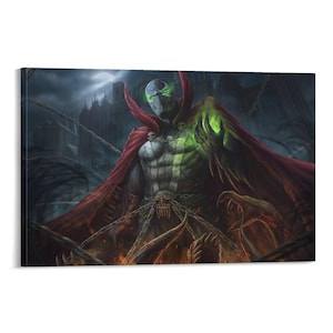 May include: A canvas print featuring Spawn, a comic book character, in a dark, gothic setting. Spawn is depicted with a red cape, chains, and a skull-like mask with glowing green eyes. The artwork has a detailed, dramatic style.