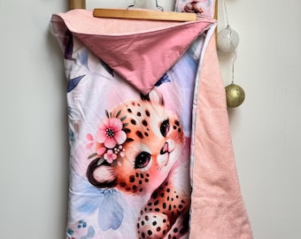 Bath cape and 4 animal-themed washcloths with a floral savannah design