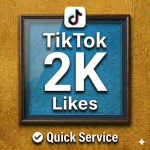 May include: A white ceramic mug with a black handle and the text "But First, Coffee" in a bold, black font. The mug is set against a neutral background, highlighting its simple design.