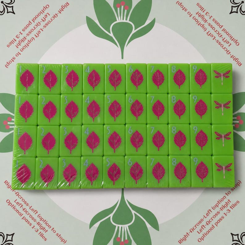 May include: A set of rectangular green tiles arranged in a grid, featuring pink leaf illustrations and numbers one through nine, with dragonfly icons on the end column. The text "Right-Across-Left (option to stop) Left-Across-Right Optional pass 1-3 tiles" appears.