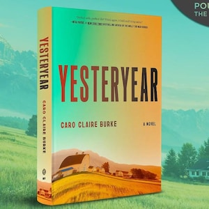 May include: A hardcover book titled "Yesteryear" by Caro Claire Burke. The book cover features a gradient of colors and a rural landscape illustration. The title is in large, bold letters. The background shows a scenic view of a farm and mountains.
