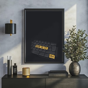 Könnte beinhalten: Ein gerahmter Wandkunstdruck mit schwarzem Hintergrund und einer grafischen Darstellung einer Computertastatur. Die Tasten sind schwarz, wobei die Buchstaben S, E, L, F und das Wort ctrl gelb hervorgehoben sind und SELF ctrl bilden.