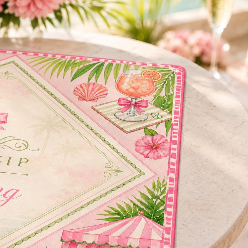 May include: A pink placemat with a tropical theme, featuring illustrations of a cocktail, seashells, palm trees, and hibiscus flowers. The placemat has a decorative border and the word "SIP" is visible.