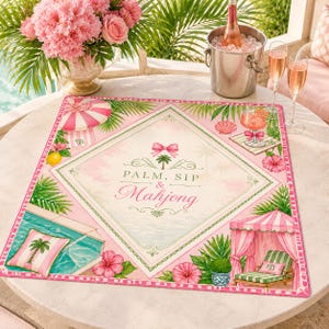 May include: A pink and green square placemat with the words "PALM, SIP & Mahjong" in the center. The placemat features illustrations of a pool, a cabana, a cocktail, and tropical foliage. A bottle of ros&eacute; is in an ice bucket.