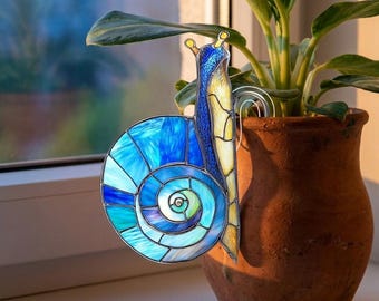 Coprivaso a forma di lumaca blu: ornamento da giardino in resina effetto vetrata.