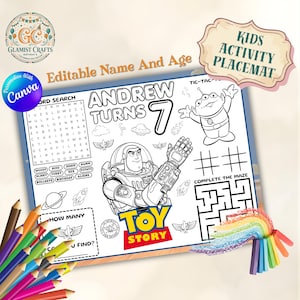 May include: A children's activity placemat with a Toy Story design, featuring a word search, tic-tac-toe, and a maze. The placemat is personalized with a name and age. The design is in black and white, with a set of coloured pencils visible.