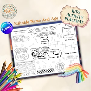 May include: A personalized kids' activity placemat featuring Lightning McQueen from the Cars movie. The black and white design includes a dot-to-dot game, a maze, and tic-tac-toe, with the name "Andrew" and the age "5" prominently displayed. Includes a Route 66 sign.