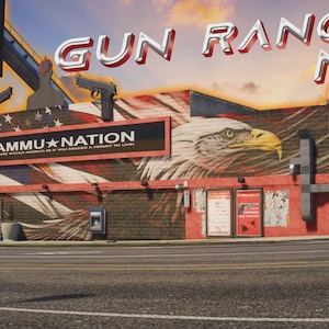 Puede incluir: Una representación digital de un edificio comercial etiquetado como Ammu-Nation con un gran mural de la bandera estadounidense y un águila calva en la fachada de ladrillo. La estructura presenta un letrero negro con texto blanco y puertas de cristal.