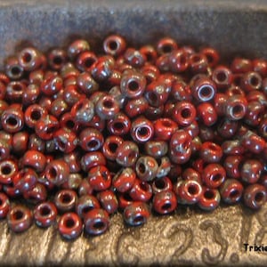 Size 11/0 Miyuki Round Seed Beads -  Opaque Red Picasso, 10 grams