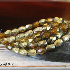 5mm x 7mm Czech Faceted Glass Oval/Olives - ETCHED Dark Orange Root Beer Brown with Golden Half-Coat, 20 Beads