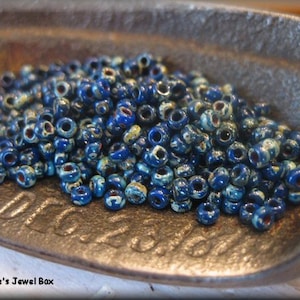 Size 11/0 Miyuki Round Seed Beads -  Lapis Blue Picasso, 10 grams