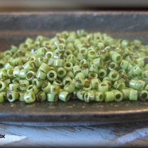 Size 11/0 Miyuki Delica Seed Bead - Opaque Chartreuse Green Picasso, 5 grams