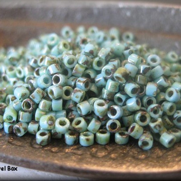 Size 11/0 Miyuki Delica Seed Bead -  Blue Turquoise Picasso, 5 grams