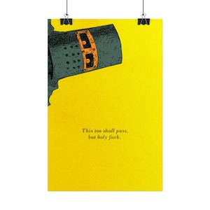 May include: A vertical poster with a bright yellow background featuring a dark grey knight helmet with an orange visor detail in the upper left corner. The text "This too shall pass, but holy fuck." is printed in black in the lower center of the poster.