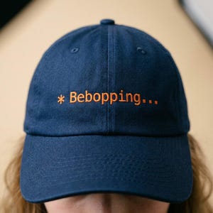 Bebopping... Embroidered Dad Hat | Code CLI, AI Humor, Vibe Coding
