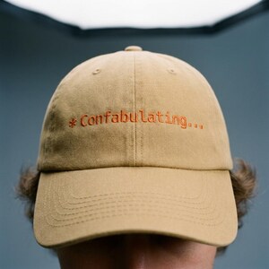 Confabulating... Embroidered Dad Hat | Code CLI, AI Humor, Vibe Coding