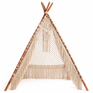 May include: A cream-colored macrame teepee-shaped wall hanging. The frame is made of wooden poles tied together at the top. The macrame features a diamond pattern and fringe detailing, creating a bohemian aesthetic.
