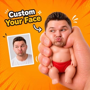 May include: A small doll with a custom printed face featuring a person with pursed lips, wearing red underwear. The doll is held in a hand against an orange background with the text Custom Your Face and a photo of the person's face.