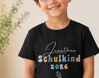 Einschulung Shirt personalisiert mit Wunschnamen – Schulkind 2026 T-Shirt für Jungen & Mädchen – Geschenk zum Schulanfang mit Schultüte