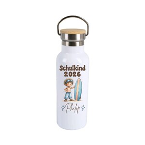 May include: A white water bottle with a silver metal neck and a light wood lid. The bottle features the text Schulkind 2026, an illustration of a child with a surfboard, and the name Philip written in script with small star icons on each side.