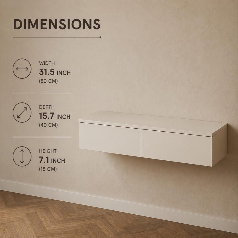 May include: A wall-mounted, off-white floating cabinet with two drawers. The dimensions are displayed: 31.5 inches wide, 15.7 inches deep, and 7.1 inches high. The text "DIMENSIONS" is at the top of the image.