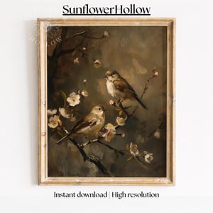 Puede incluir: Pintura enmarcada de estilo vintage con dos pequeños pájaros posados en ramas florecidas. La obra de arte tiene una paleta de colores apagados con tonos marrones, beige y blancos. El texto "SunflowerHollow" está en la parte superior y "Instant download | High resolution" en la inferior.