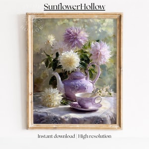 May include: A framed floral still life painting featuring a purple teapot, teacup, and saucer set, with a bouquet of white and lavender dahlias. The painting is on a table covered with a white lace tablecloth. The text "SunflowerHollow" is at the top.