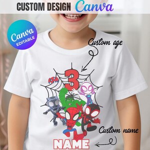 May include: White t-shirt featuring a colorful graphic of superheroes, a large red number 3, and a spiderweb design. The shirt has the text "NAME" at the bottom and "CUSTOM DESIGN Canva" at the top. The design is customizable.