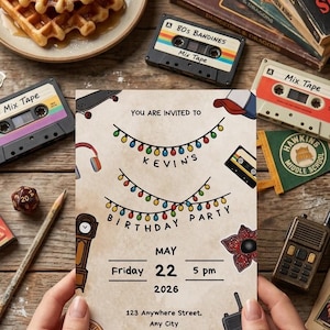 May include: A themed birthday party invitation with a retro aesthetic, featuring cassette tapes, waffles, and books. The invitation is held by hands and includes the date: Friday, May 22, 2026, at 5 pm.