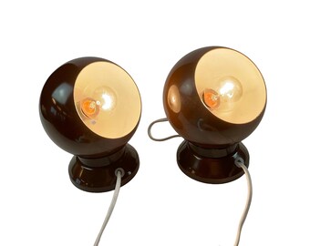 A pair of Hamalux ball wall lamps with magnets, all in brown colour.