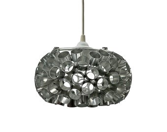Danish Space Age lamp of aluminum with a glass "crystal" in the center.