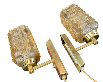 Vintage wall lamp sconces "Laoni", brass and glass, a pair from the 1960s.