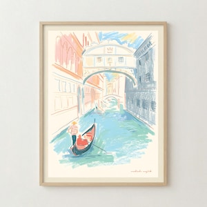 May include: A framed art print featuring a pastel-colored sketch of a Venetian canal scene. A gondolier in a striped shirt steers a gondola under the Bridge of Sighs. The illustration uses soft blue, peach, and yellow crayon-like strokes.