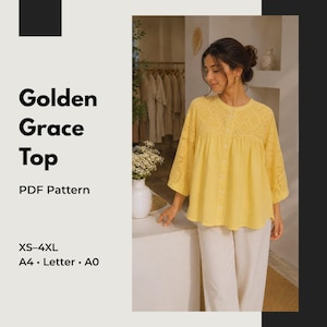 Könnte beinhalten: Ein gelbes Langarm-Oberteil mit Lochstickerei an Passe und Ärmeln, mit durchgehender Knopfleiste und lockerer Passform. Der Text auf der linken Seite lautet Golden Grace Top, PDF Pattern, XS-4XL, A4, Letter, A0.
