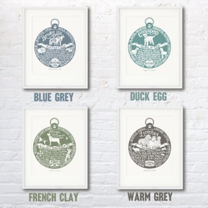May include: Four framed prints of dog breeds, each with a circular design featuring the breed's name and characteristics. The prints are in four different colors: blue grey, duck egg, French clay, and warm grey.