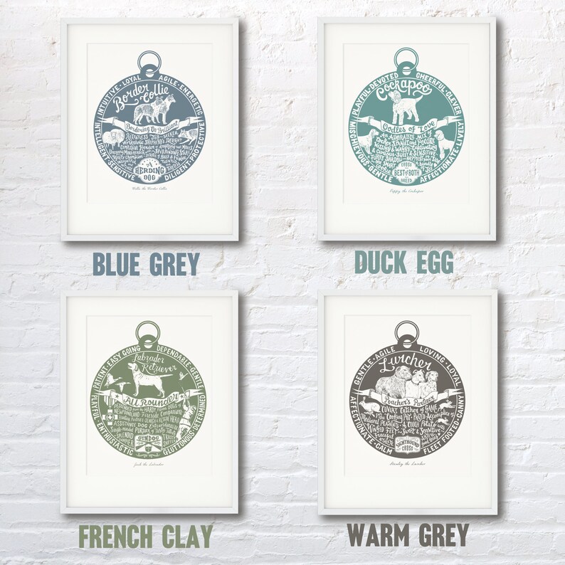 May include: Four framed prints of dog breeds, each with a circular design featuring the breed's name and characteristics. The prints are in four different colors: blue grey, duck egg, French clay, and warm grey.