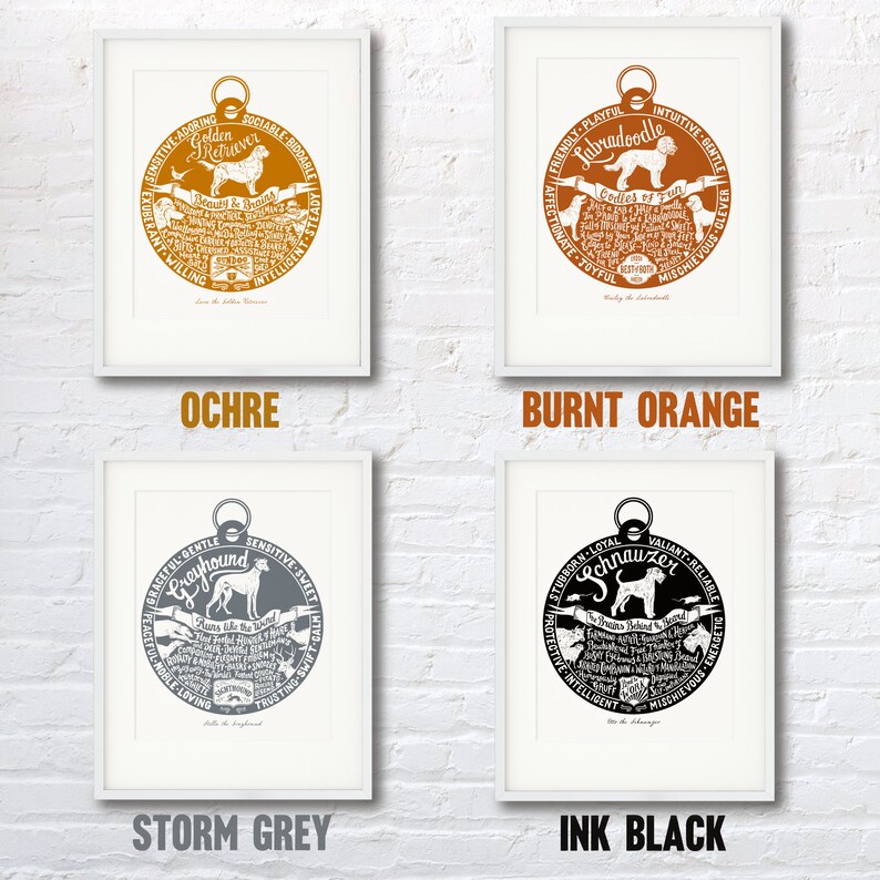 May include: Four framed prints of dog breeds, each with a circular design featuring the dog's name and a list of personality traits. The prints are in four different colors: ochre, burnt orange, storm grey, and ink black.