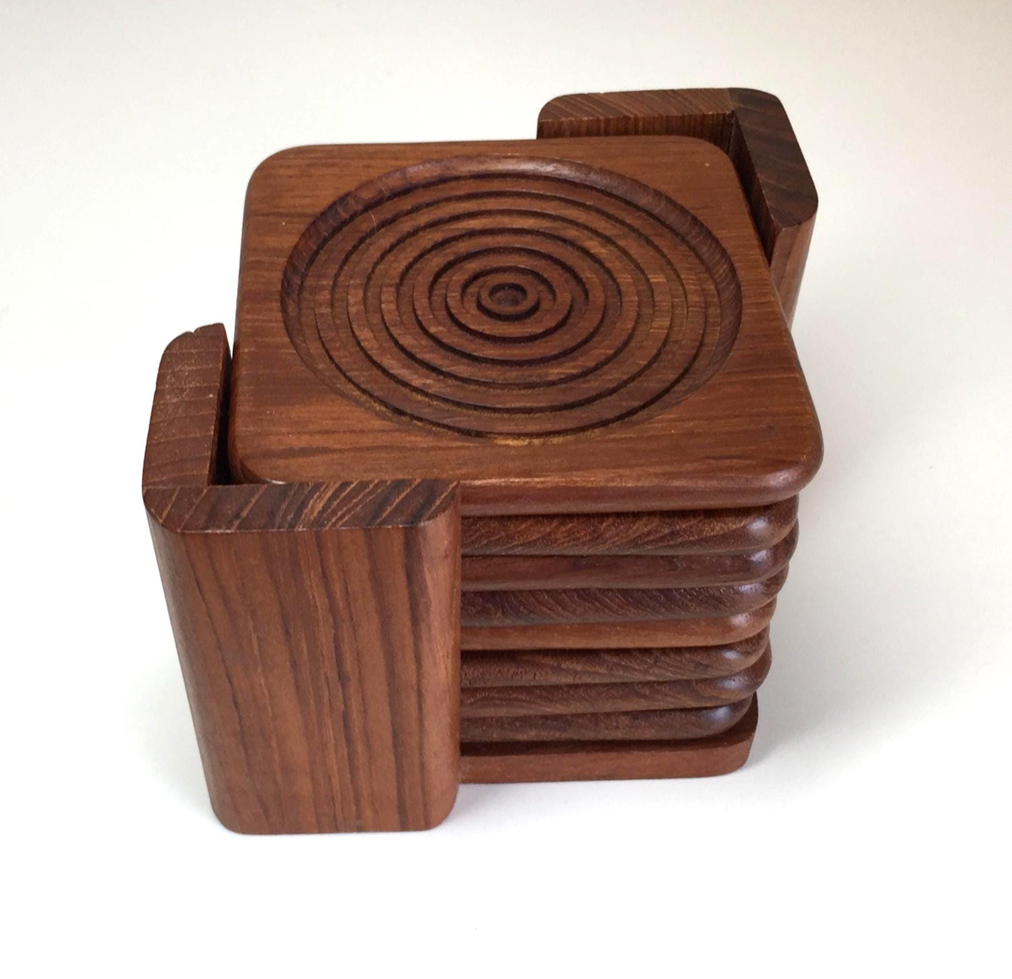 Vintage MCM Teak Wood Coasters in Stand Carved Bullseye Circular Pattern