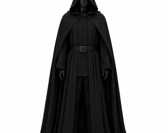 May include: A full-length black hooded cloak worn over a matching black tunic and trousers. The ensemble features a long, flowing cape with a hood, a button-down tunic with vertical pleats, and a black belt with a rectangular metal buckle.