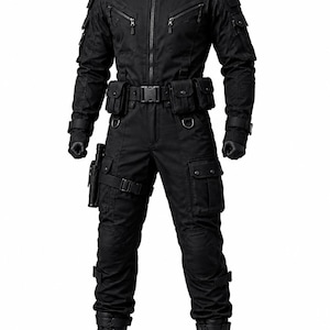 May include: A black tactical jumpsuit featuring a high collar, a full-length front zipper, and multiple utility pockets on the chest, arms, and legs. The garment includes a waist belt with attached pouches, D-rings, and black combat boots.