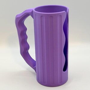 May include: A set of three ceramic mugs with a speckled, matte finish. The mugs are in shades of cream, light gray, and dark gray. Each mug has a simple, minimalist design, perfect for coffee or tea.
