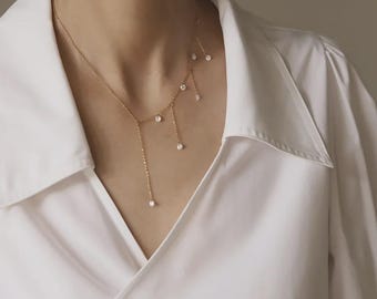 Gold CZ Drip Necklace – Elegant Cubic Zirconia Pendant