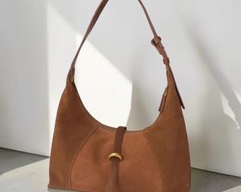 Bolsa transversal feminina em couro legítimo, estilo hobo, em couro bovino de alta qualidade, ideal para usar debaixo do braço ou como bolsa de mão. Bolsa moderna para o dia a dia.