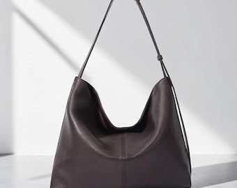 Bolsa tote feminina em couro de cordeiro, bolsa de ombro macia, bolsa transversal de grande capacidade, bolsa minimalista para o dia a dia, bolsa de grife para deslocamento diário.