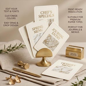 May include: A collection of printable design templates, including menu cards and journal entries, displayed on a neutral linen surface. The cards feature elegant gold text and marble-like backgrounds. The image includes a gold pen, stamp, and card holder.