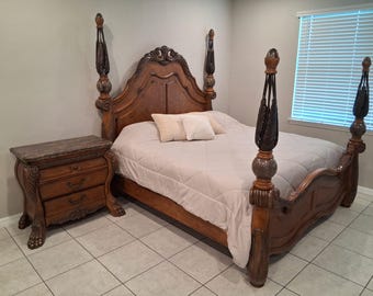 Bed frame from the Eden collection (also referred to as Eden's Paradise) by Michael Amini