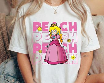 Super Mario Peach tryckklar DTF-överföring, Nintendo World familjematchning semesterresa matchande t-shirt, Mario födelsedagsresa present värmepress